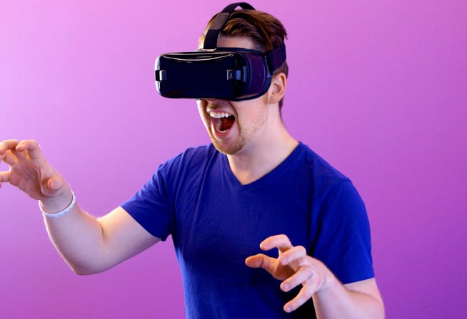 A man with a virtual reality headset